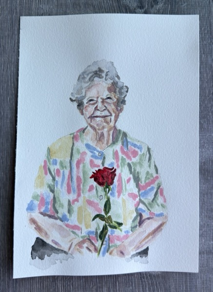 Watercolor portrait of an older woman in a colorful blouse holding a red rose